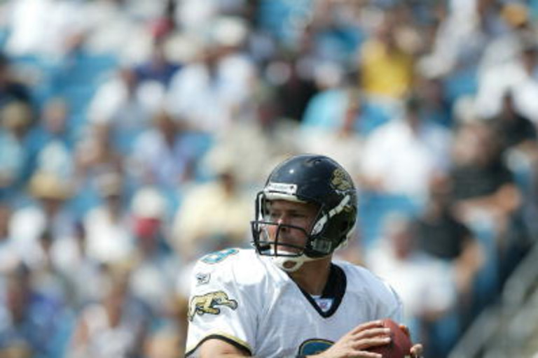 Tony Brackens of the Jacksonville Jaguars stands on the field